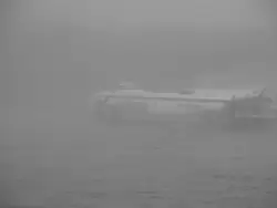 СПК «Игумен Назарий» выходит из устья Вуоксы в Ладогу в сплошном тумане