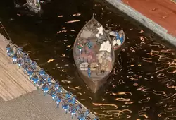 Лодка с грузом на Большом канале Кронштадта в музее «Петровская Акватория»